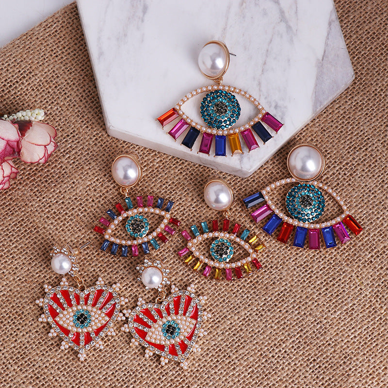 New Angel Eye Earrings Net Red Earrings Female Korean Trendy French Devil Stud Earrings